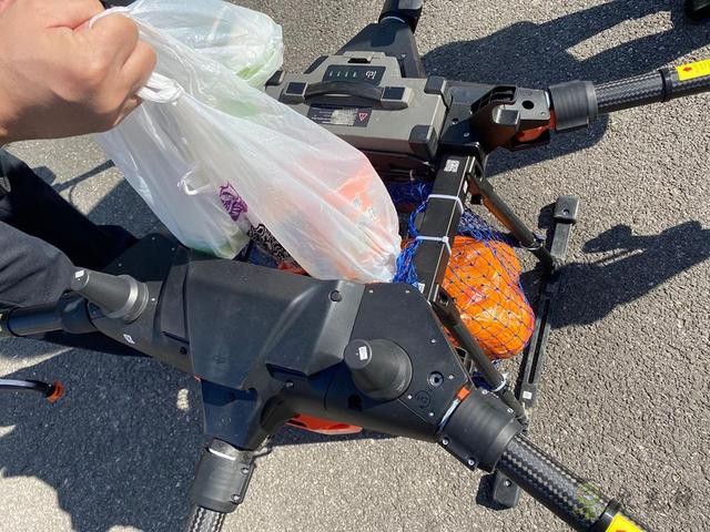 農(nóng)業(yè)無人機變身&ldquo;運輸機&rdquo;，上海奉賢用無人機服務隔離人員
